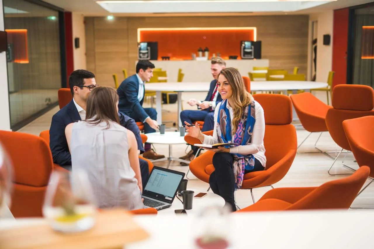 a group of people sitting in a meeting room at Apex City of Bath Hotel in Bath